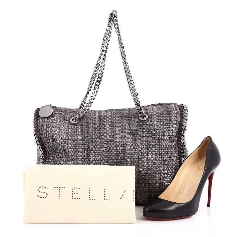 This authentic Stella McCartney Falabella Boston Bag Boucle is perfect for casual day-to-day excursions. Crafted in eye-catching grey boucle tweed, this soft tote features chain-link shouder straps, gunmetal chain link strap and trimmings, and