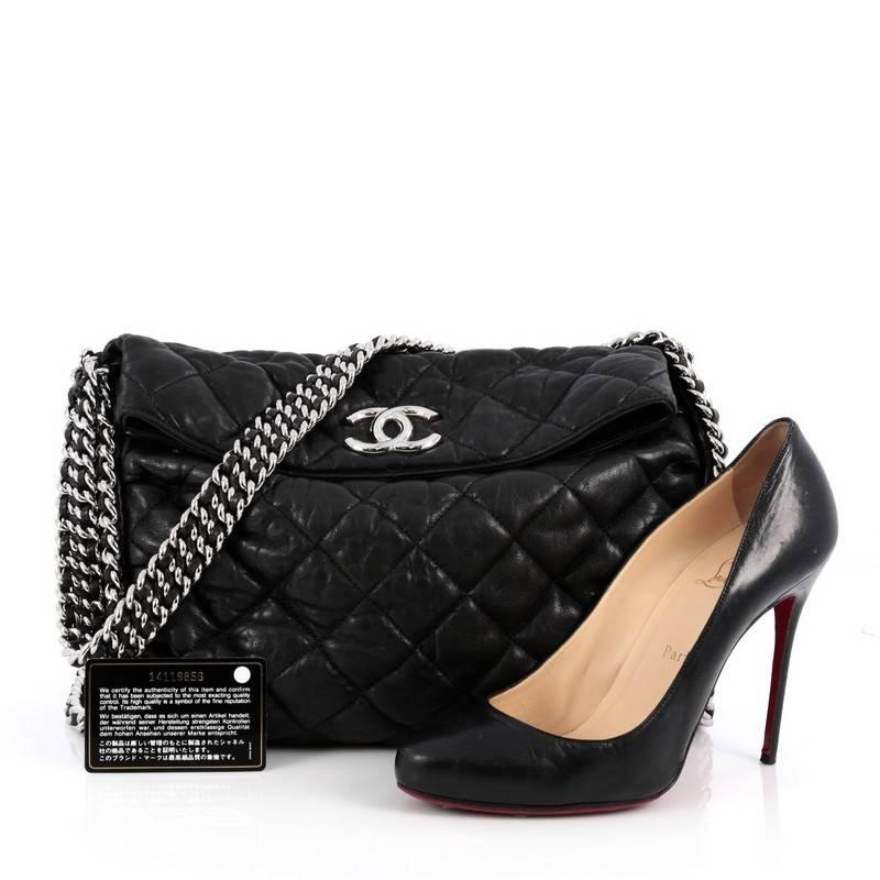 This authentic Chanel Chain Around Hobo Quilted Washed Lambskin is synonymous to casual luxury. Crafted with black washed lambskin in Chanel's signature diamond quilting, this stylish no-fuss hobo features multiple silver woven-in leather chain