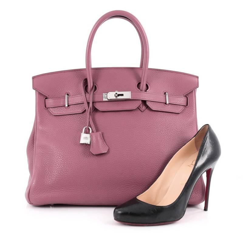 This authentic Hermes Birkin Handbag Bois de Rose Clemence with Palladium Hardware 35 stands as one of the most-coveted bags fit for any fashionista. Constructed from sturdy, scratch-resistant boise de rose pink clemence leather, this stand-out