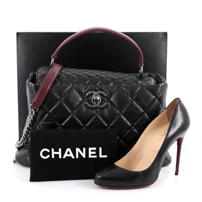 This authentic Chanel Inner Flap Shoulder Bag Quilted Aged Calfskin Medium balance the brand's penchant for timeless design with luxurious, modern edge. Crafted from black aged calfskin leather, this chic bowling bag features leather top handle,