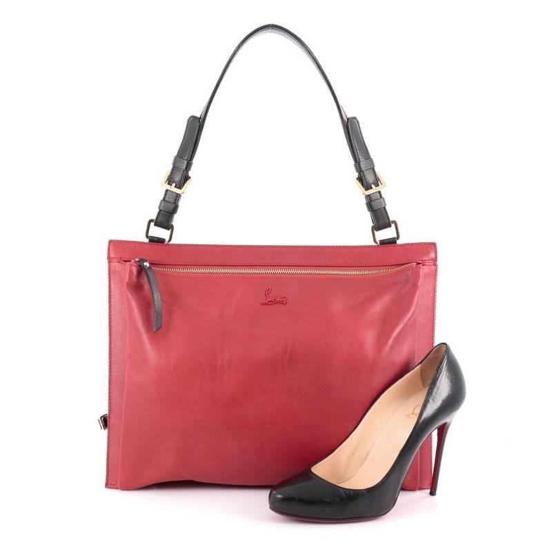 This authentic Christian Louboutin Rachel Boston Saddle Bag Leather is a sumptuous and stylish bag perfect for your daily excursions. Crafted from red leather, this bag features adjustable flat shoulder strap, Louboutin signature logo at front,