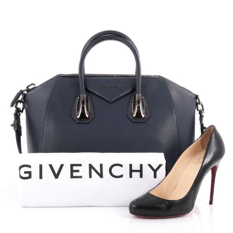 This authentic Givenchy Antigona Bag Leather and Kenya Metal Medium combines style and functionality all-in-one. Crafted from blue leather, this beloved tote features unique Kenya metal detailing on its anchors and is designed with the brand's