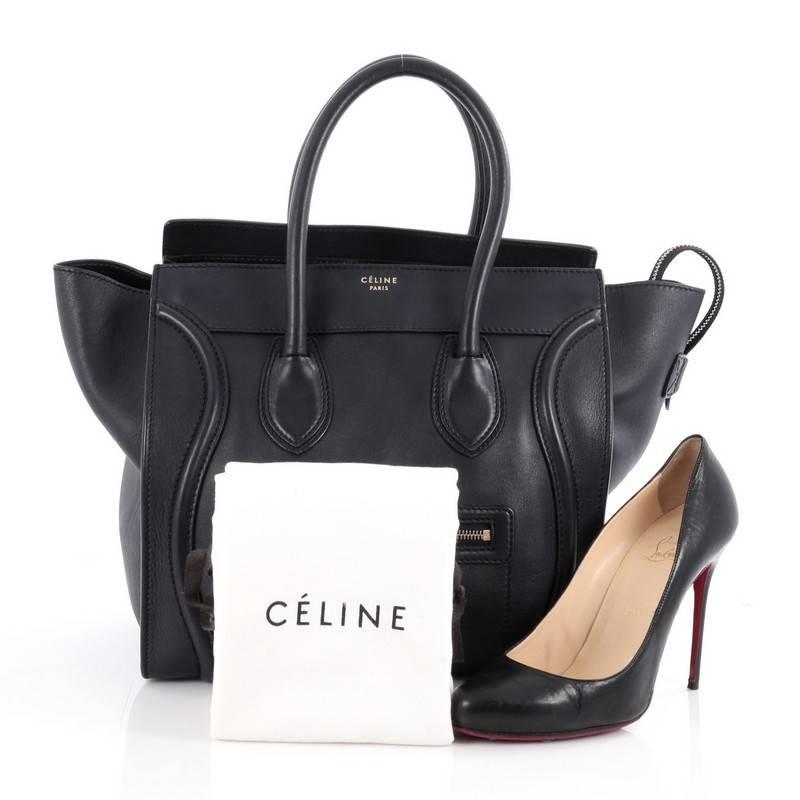 This authentic Celine Luggage Handbag Smooth Leather Mini epitomizes Phoebe Philo's minimalist yet chic style. Constructed in navy blue smooth leather, this beloved fashionista's bag features dual-rolled leather handles, a frontal zip pocket,