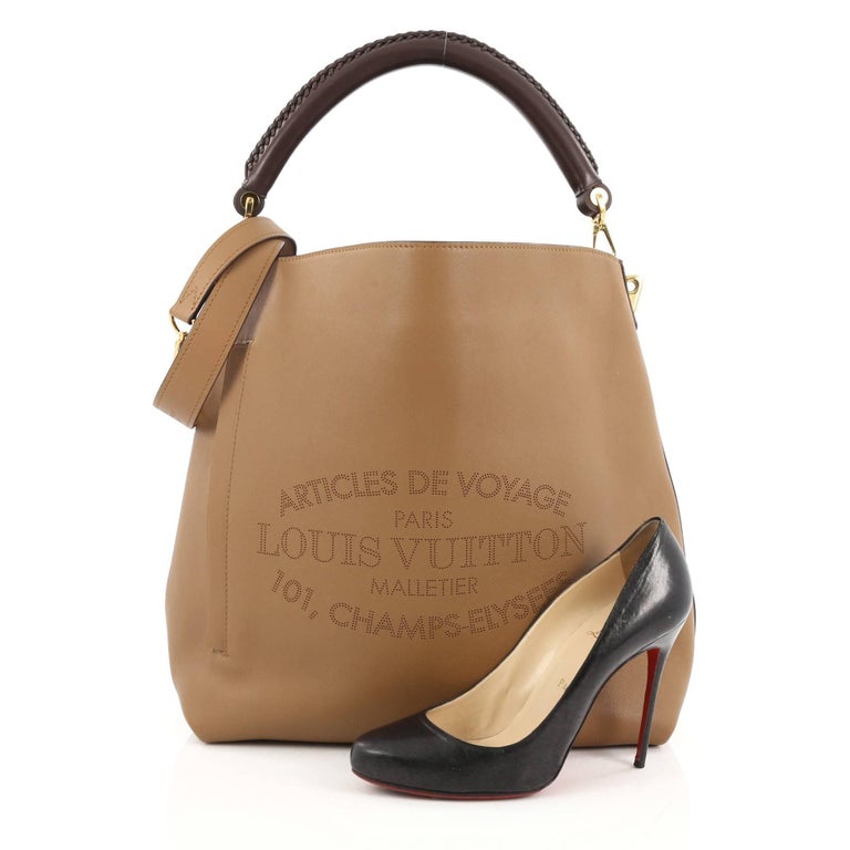 Louis Vuitton Voyage Bagatelle Hobo Leather at 1stdibs