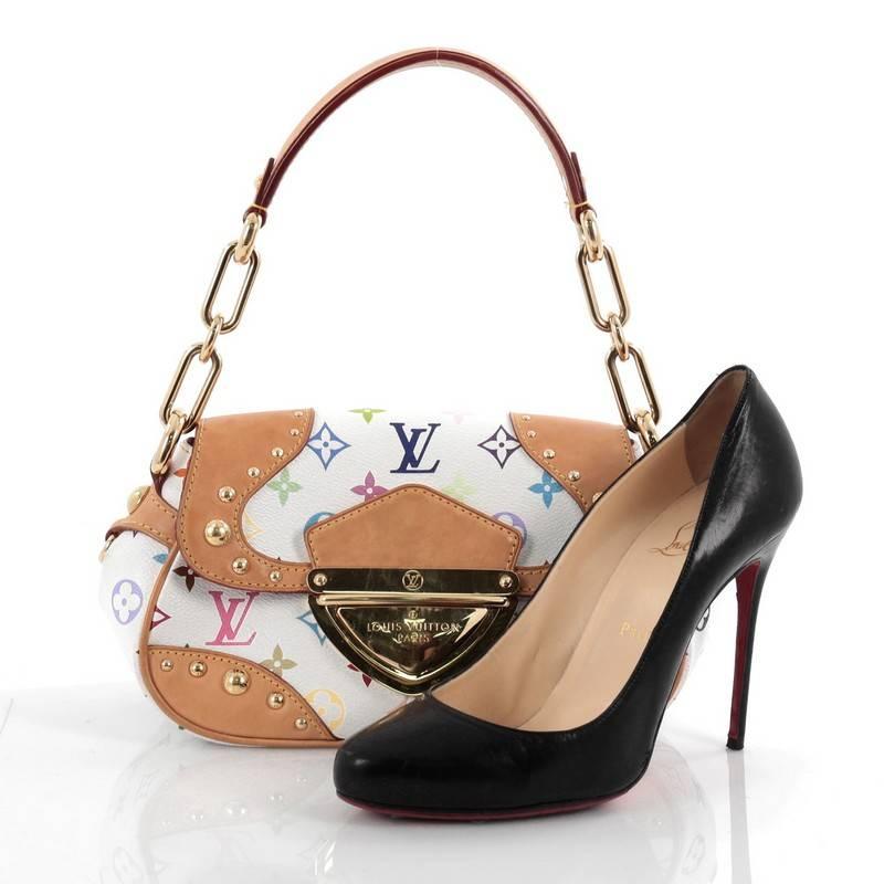 This authentic Louis Vuitton Marilyn Handbag Monogram Multicolor is classic style with a vibrant and exotic spin showcased in Fall/Winter 2007 Collection. Crafted from Takashi Murakami's popular white monogram multicolor print coated canvas, this