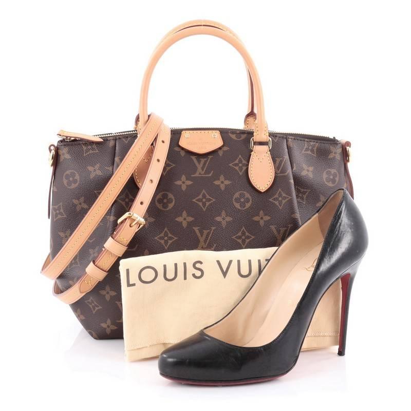 This authentic Louis Vuitton Turenne Handbag Monogram Canvas PM is an elegant must-have made for the sophisticated on-the-go woman. Crafted from brown monogram coated canvas with natural cowhide vachetta leather trims, this city satchel features