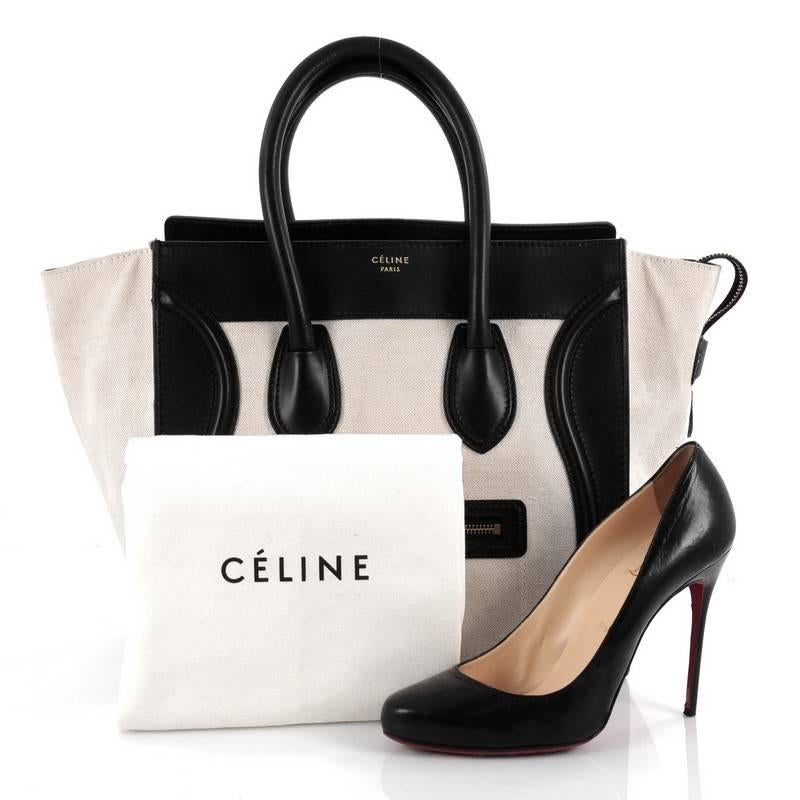 This authentic Celine Luggage Handbag Canvas and Leather Mini is one of the most sought-after bags beloved by fashionistas. Crafted from beige canvas and black leather, this minimalist tote features dual-rolled handles, an exterior front pocket,