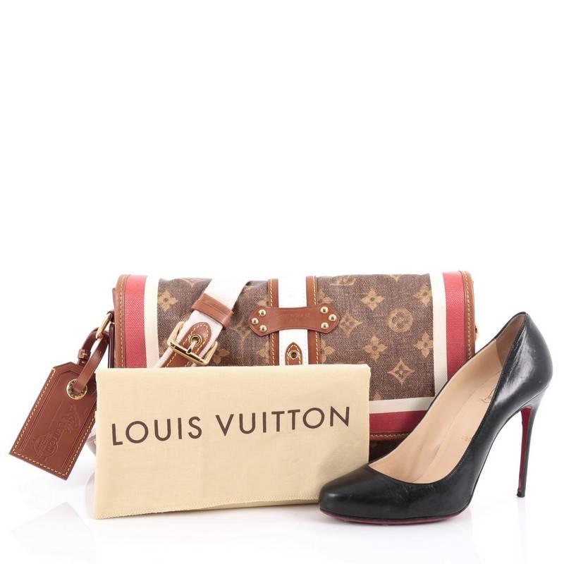 This authentic Louis Vuitton Tisse Porte Clutch Limited Edition Monogram Canvas Rayures is a stunning and rare bag that has fashion and functionality rolled into one. Crafted from brown monogram coated canvas, this vintage looking bag features