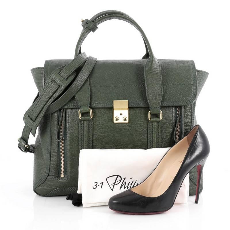 This authentic 3.1 Phillip Lim Pashli Satchel Leather Large is a practical bag with a stylish edge made for on-the-go moments. Crafted from jade green leather, this chic satchel features dual top handles, expandable zip sides, top flap push-lock