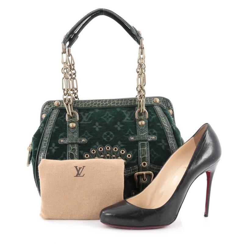 This authentic Louis Vuitton Irvine Monogram Velours and Alligator is a hard-to-find limited piece made for LV collectors that's part of the brands Fall/Winter 2004/2005 Runway Collection. Crafted from green monogram velour with genuine alligator