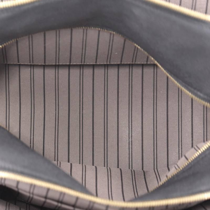 Louis Vuitton Marais Handbag Monogram Empreinte Leather MM In Good Condition In NY, NY