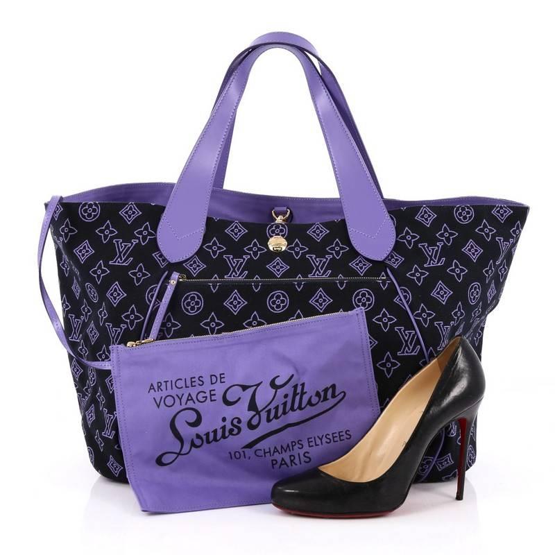 This authentic Louis Vuitton Cabas Ipanema Canvas GM presented in the brand's Summer 2009 Collection is chic and stylish in design perfect for everyday casual looks. Crafted in black and purple monogram canvas, this lightweight tote features