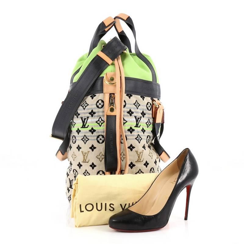 This authentic Louis Vuitton Cheche Gypsy Handbag Monogram Jacquard Fabric PM a must-have for LV collectors everywhere. Crafted from beige monogram jacquard fabric with lurex and neon threads woven through and neon green leather, fabulous and
