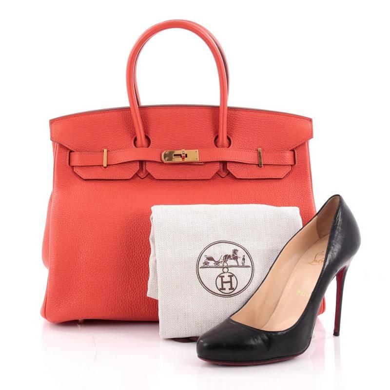 This authentic Hermes Birkin Handbag Geranium Togo with Gold Hardware 35 stands as one of the most-coveted bags. Crafted from scratch-resistant, iconic geranium red togo leather, this stand-out tote features dual-rolled top handles, frontal flap,