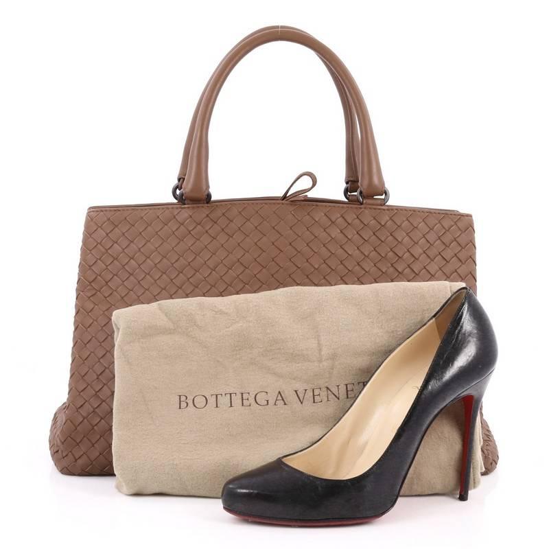 This authentic Bottega Veneta Milano Tote Intrecciato Nappa Large is a timeless, versatile piece you can surely take from day to night. Beautifully crafted in brown nappa leather in Bottega Veneta's signature intrecciato woven method, this stylish
