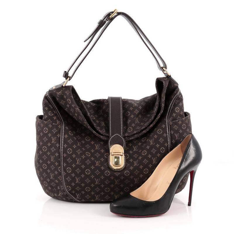 This authentic Louis Vuitton Romance Handbag Monogram Idylle is a statement piece you can surely take from day to night. Crafted with Louis Vuitton’s signature brown monogram idylle, this bag features side slip pockets, an adjustable shoulder strap,