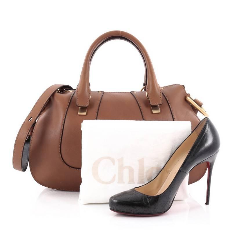 This authentic Chloe Hayley Satchel Leather Medium is from the brands' Fall 2015 Collection that is the newest addition to Chloe's coveted handbag collection. Crafted from brown leather, this chic bag features dual-rolled leather handles, knotted