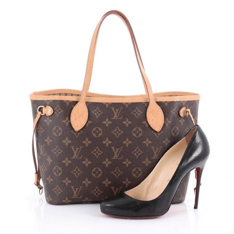This authentic Louis Vuitton Neverfull NM Tote Monogram Canvas PM is a perfect companion for daily excursions. Crafted from Louis Vuitton’s signature brown monogram canvas, this iconic, easy-to-carry bag features natural dual flat leather shoulder