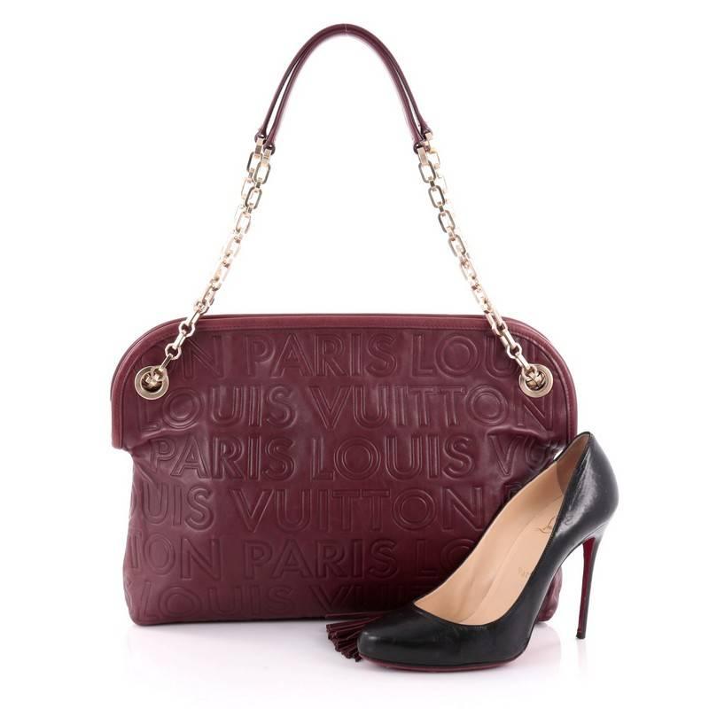 This authentic Louis Vuitton Limited Edition Paris Souple Wish Bag Leather is one of Marc Jacob's standouts from Louis Vuitton's Fall/Winter 2008 Collection. Crafted from maroon leather, this popular wish bag features leather handles with gold-tone