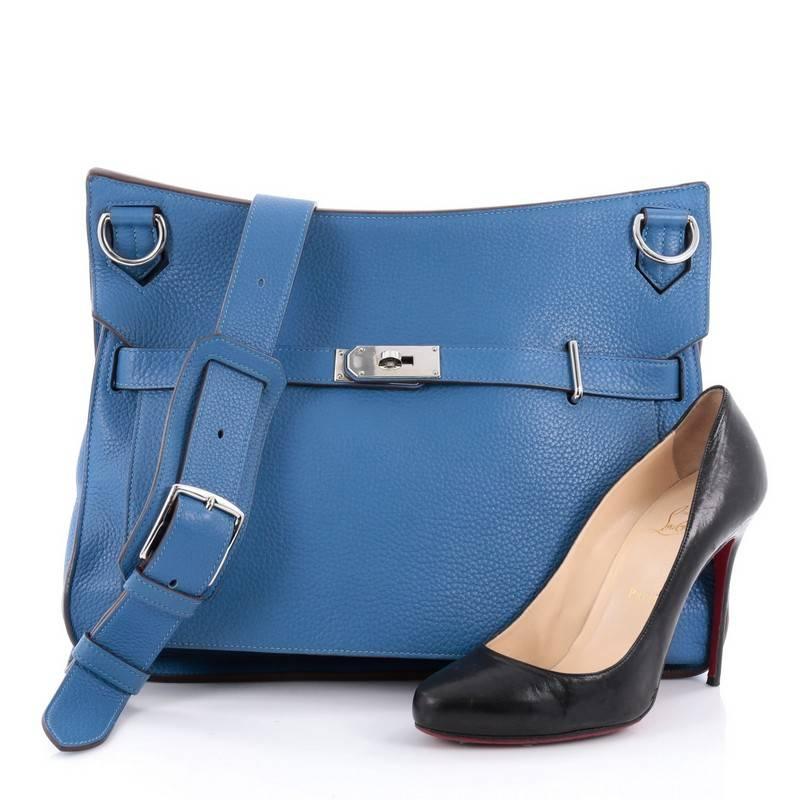 This authentic Hermes Jypsiere Handbag Clemence 37 is a current and favorite style among Hermes lovers. Inspired by the brand's iconic Kelly bag, this luxurious and industrial messenger is crafted in scratch-resistant mykonos blue clemence leather