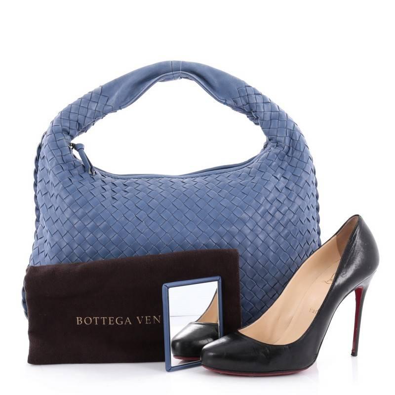 This authentic Bottega Veneta Veneta Hobo Intrecciato Nappa Medium is a timelessly elegant bag with a casual silhouette. Excellently crafted from blue leather woven in Bottega Veneta's signature intrecciato method, this no-fuss hobo features a
