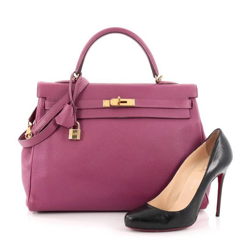 This authentic Hermes Kelly Handbag Tosca Togo with Gold Hardware 35 is as classic and timeless as they come. Designed in tosca purple togo leather and accented with polished gold hardware, this Kelly showcases an updated look to the classic sellier