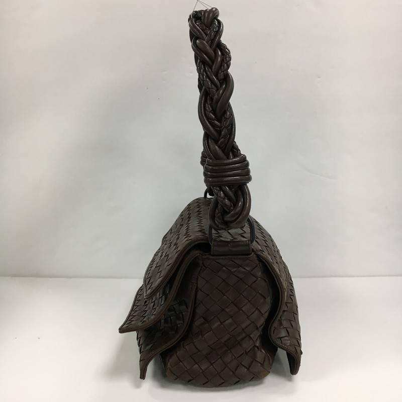 This authentic Bottega Veneta Braided Double Flap Bag Intrecciato Nappa combines the brand's casual design with high craftsmanship. Crafted in dark brown nappa leather in Bottega Veneta's signature intrecciato method, this bag features braided