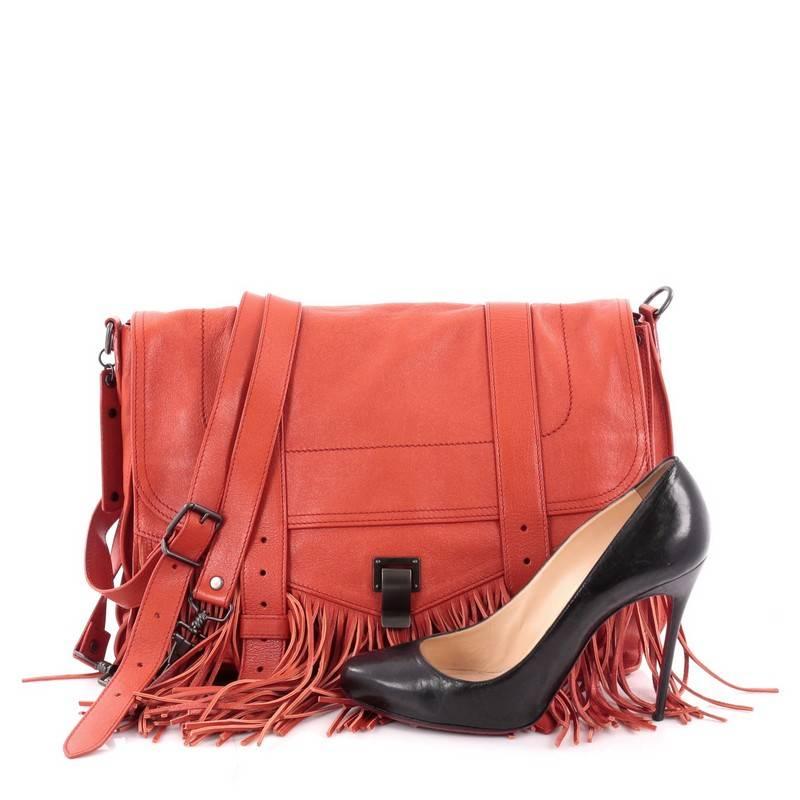This authentic Proenza Schouler PS1 Fringe Runner Handbag Leather Large presented in the brand's Fall/ Winter 2014 Collection mixes the brand's iconic It satchel with fun, modern styling made for fashionistas. Constructed from burnt orange leather,