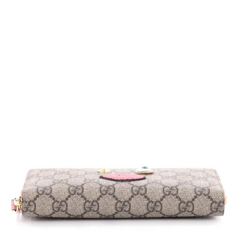 Women's or Men's Gucci Zip Around Wallet GG Coated Canvas with Face Applique