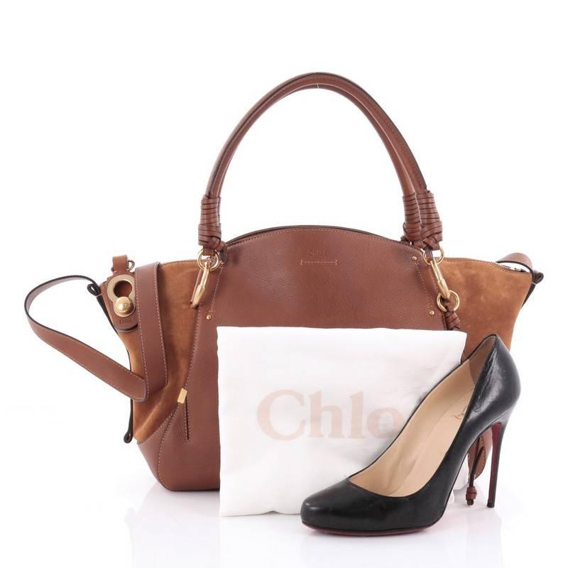 This authentic Chloe Owen Satchel Leather with Suede Medium is the perfect bag that you will surely see in the arms of all the coolest influencers at fashion week. Crafted in brown leather and suede, this stylish bag features dual-rolled leather