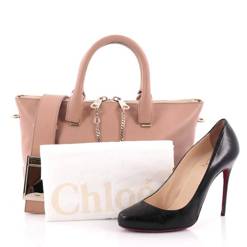 This authentic Chloe Bicolor Baylee Satchel Leather Small showcases Chloe's signature balance of casual feminine style in its minimalist design is the perfect day-to-day companion. Constructed from bicolor peach and and light pink mauve leather,