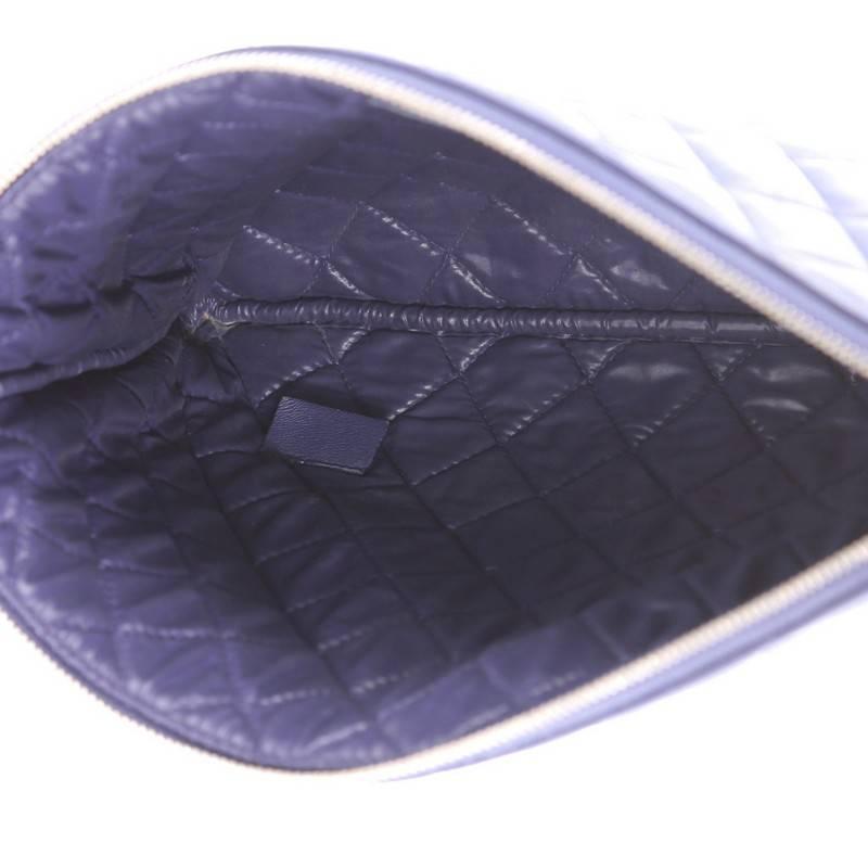 Chanel O Case Clutch Quilted Lambskin Medium 1