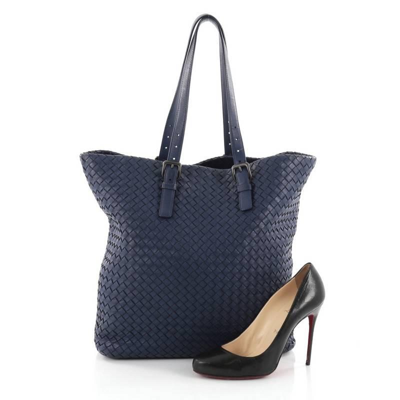 This authentic Bottega Veneta A-Shape Tote Intrecciato Nappa XL is a statement piece you can surely take from day to night. Crafted in blue leather woven in Bottega Veneta's signature intrecciato method, this stylish tote features adjustable dual
