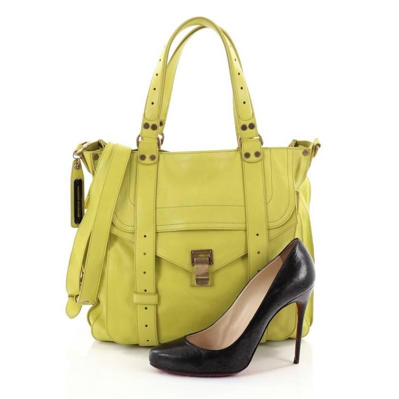 This authentic Proenza Schouler PS1 Convertible Tote Leather is the ideal way to travel with style and functionality. Constructed in neon yellow leather, this popular tote features dual flat leather handles, a detachable shoulder strap, a large