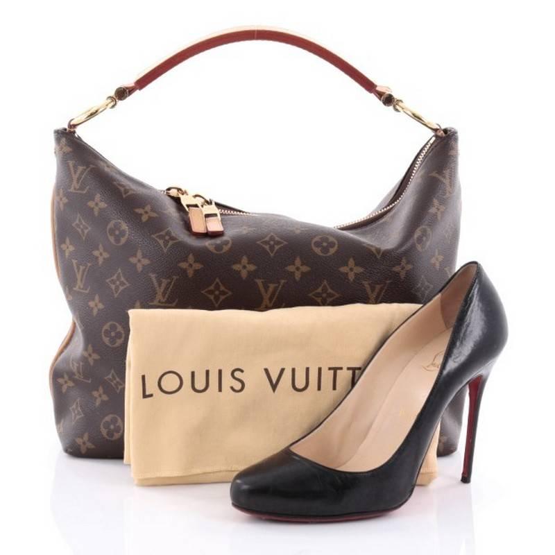 This authentic Louis Vuitton Sully Handbag Monogram Canvas PM is a timeless, elegant accessory that marries vintage detailing with a contemporary hobo shape. Crafted from Louis Vuitton's iconic brown monogram coated canvas, this stylish bag features