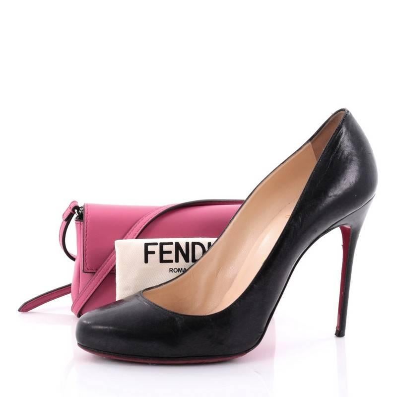 This authentic Fendi Baguette Leather Micro is a show-stopping must-have accessory for the boldest of fashionistas. Crafted from magenta leather, this fun and trendy bag features adjustable leather strap, silver chain handle, front flap with Fendi