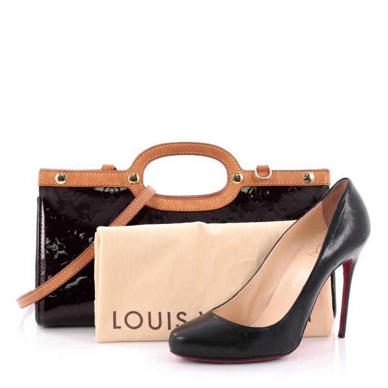 This authentic Louis Vuitton Roxbury Drive Handbag Monogram Vernis showcases a unique boxy, triangular silhouette. Constructed from amarante monogram vernis, this bag features flat vachetta leather handles and trims, stud detailing, and gold-tone
