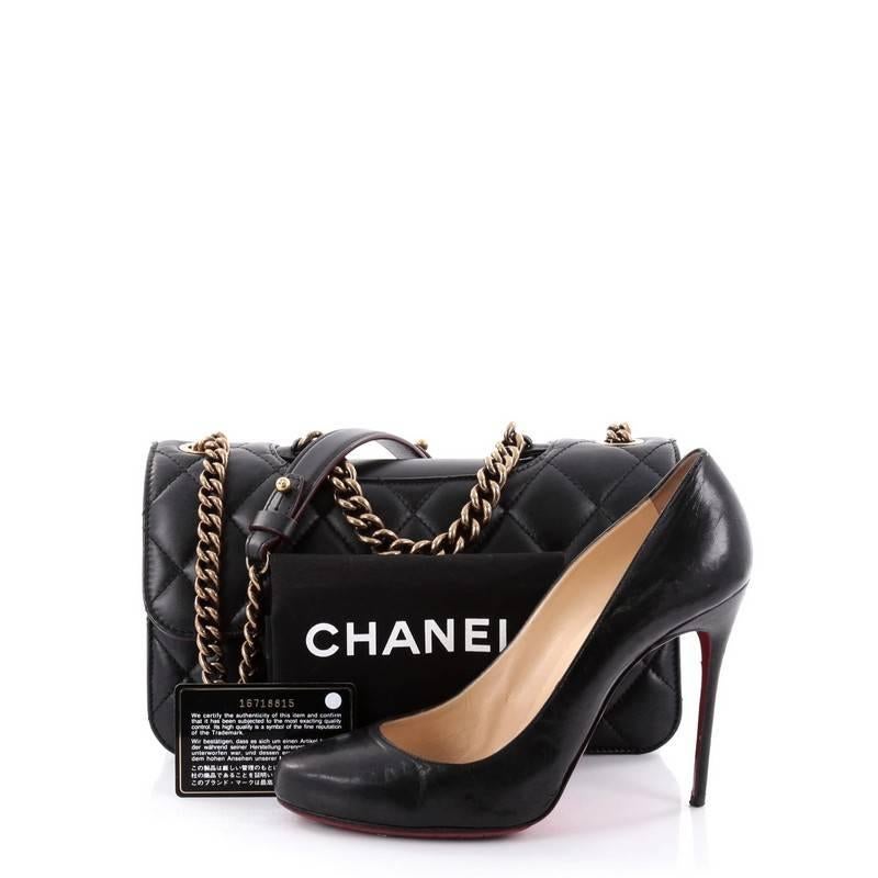 This authentic Chanel Perfect Edge Flap Bag Quilted Calfskin Small, released in Chanel's Fall 2012-2013 Collection, is an eye-catching modern update to the classic flap. Crafted from signature black diamond quilted calfskin leather, this new-school
