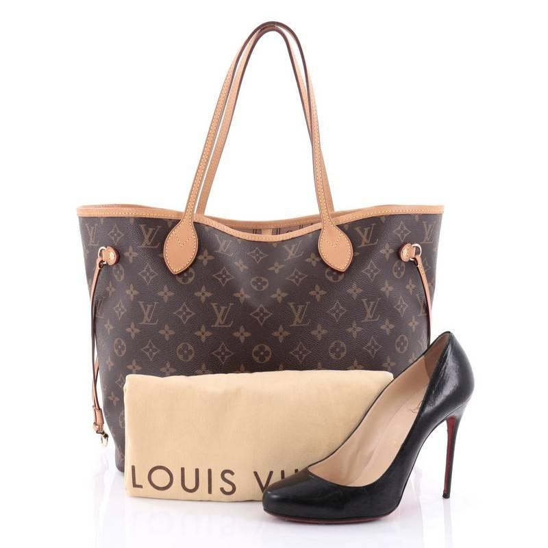 This authentic Louis Vuitton Neverfull Tote Monogram Canvas MM is a popular and practical oversized tote beloved by many. Constructed with Louis Vuitton's signature brown monogram coated canvas, this tote features dual slim vachetta leather handles,