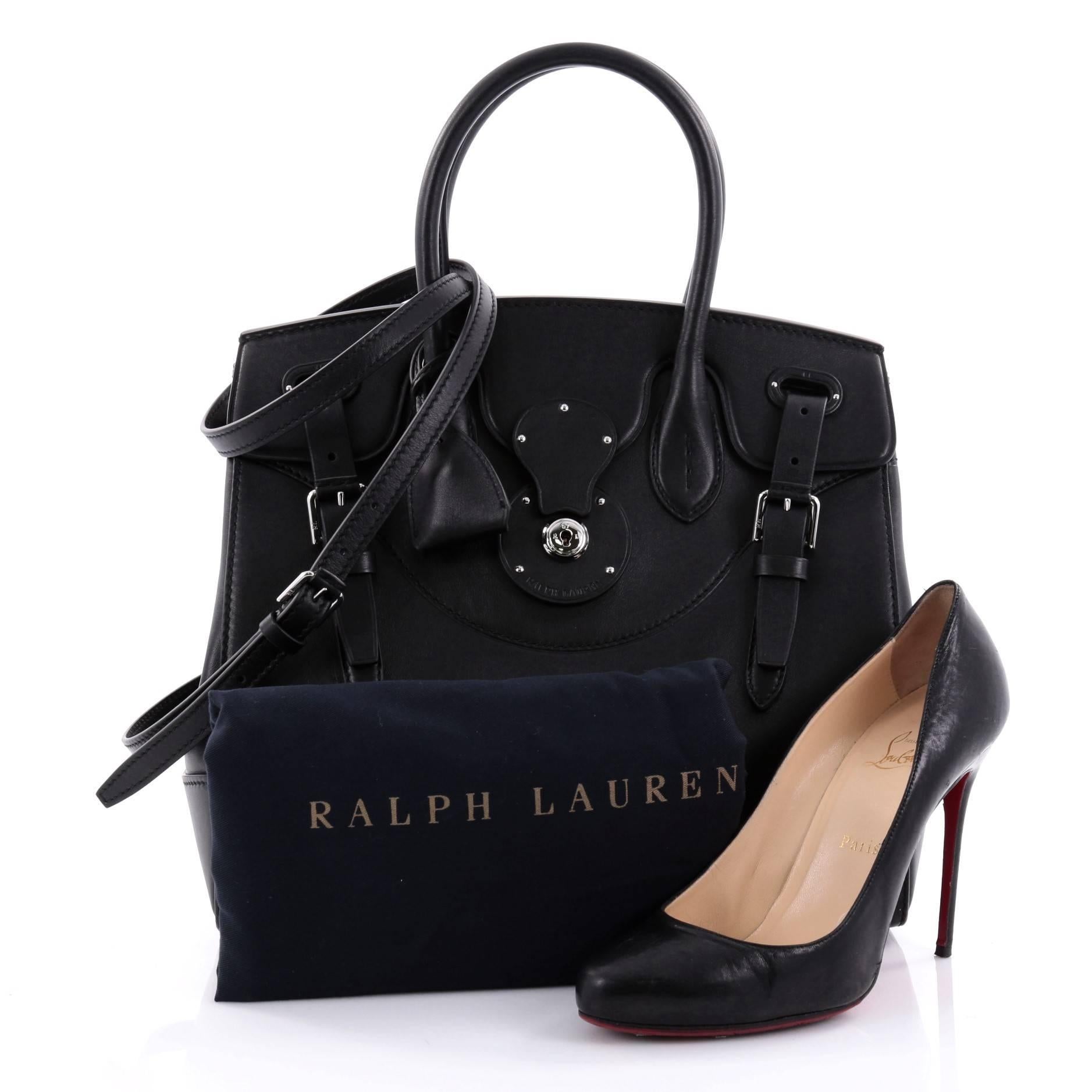 This authentic Ralph Lauren Collection Soft Ricky Handbag Leather 33 is one of the brand's most beloved styles. Crafted from black leather, this understated, elegant tote features a boxy silhouette, a folded top with a slide-lock clasp and belted