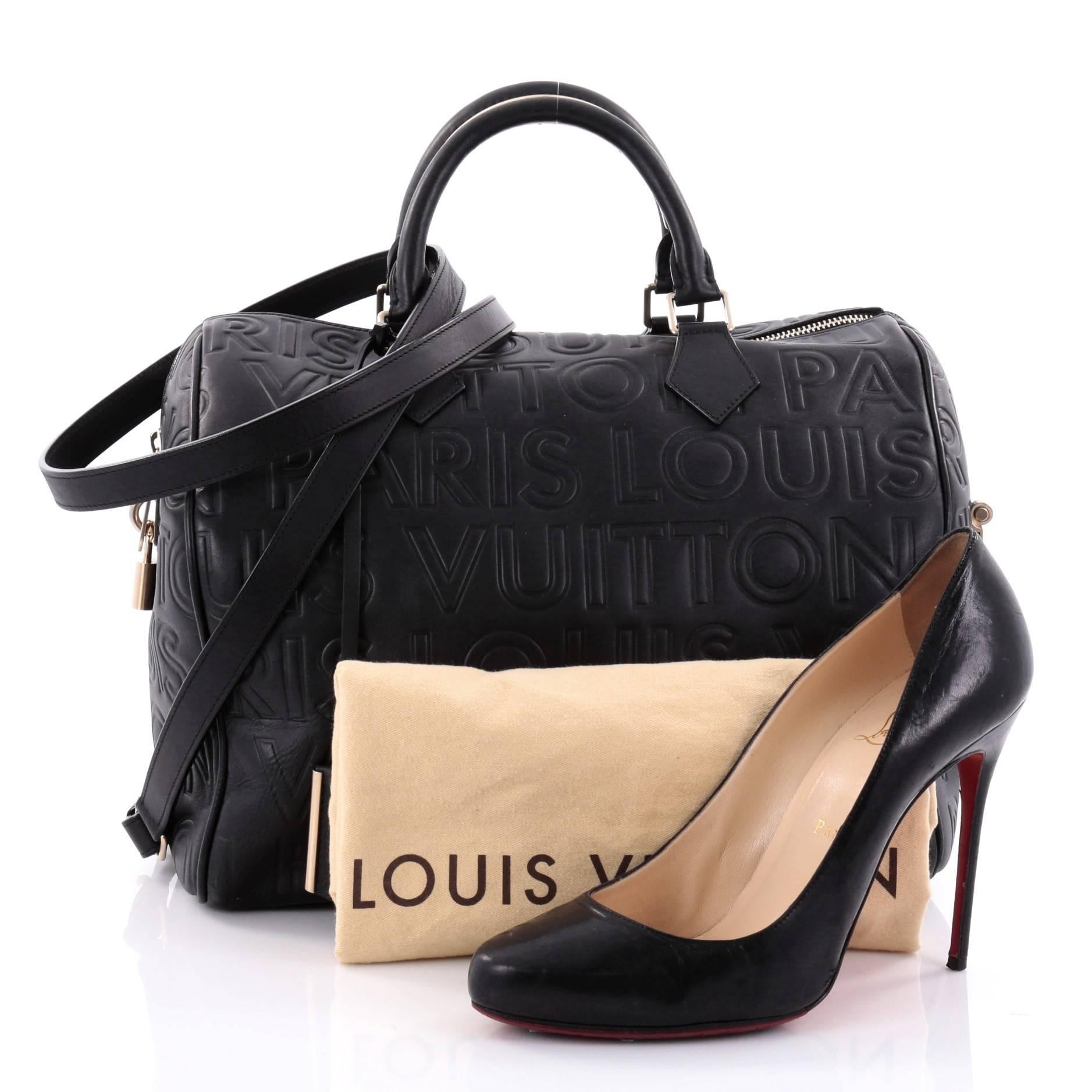 This authentic Louis Vuitton Paris Speedy Cube Bag Embossed Leather 30 presented in the brand's Fall/Winter 2008 Collection updates the classic Speedy with a youthful, edgy style. Crafted from supple black leather, this Speedy features embossed