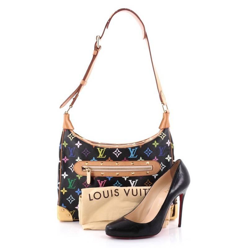 This authentic Louis Vuitton Boulogne Handbag Monogram Multicolor showcases a stylish and stunning design perfect for everyday use. Crafted from black monogram multicolor coated canvas, this elegant shoulder bag features an adjustable shoulder