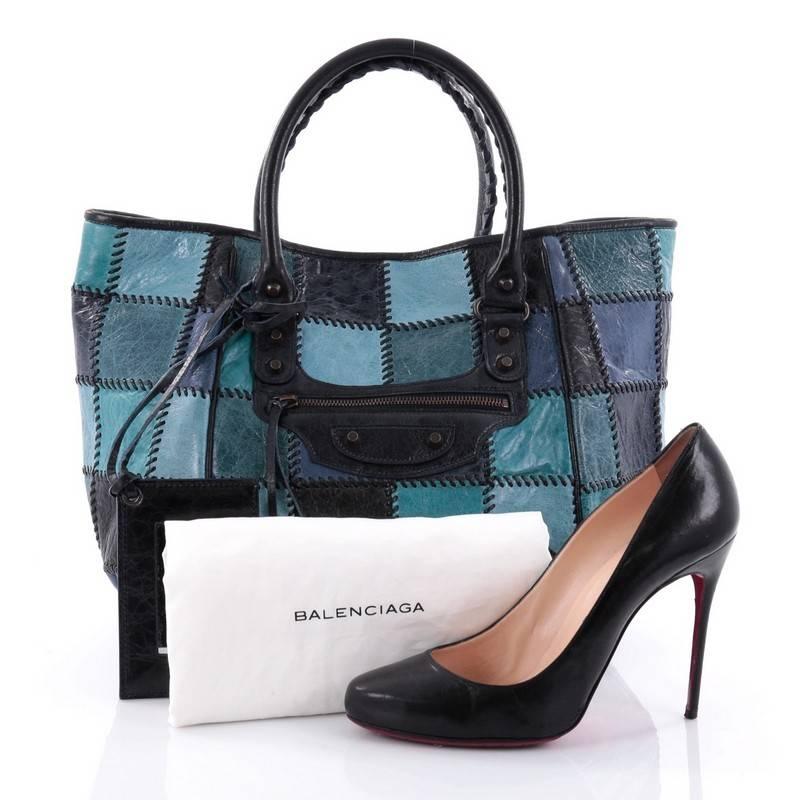This unique Balenciaga Sunday Tote Classic Studs Patchwork Leather Small is stylish and beautiful in design, made for everyday use. Constructed in blue patchwork leather, this tote features dual-rolled braided handles, signature Balenciaga buckle