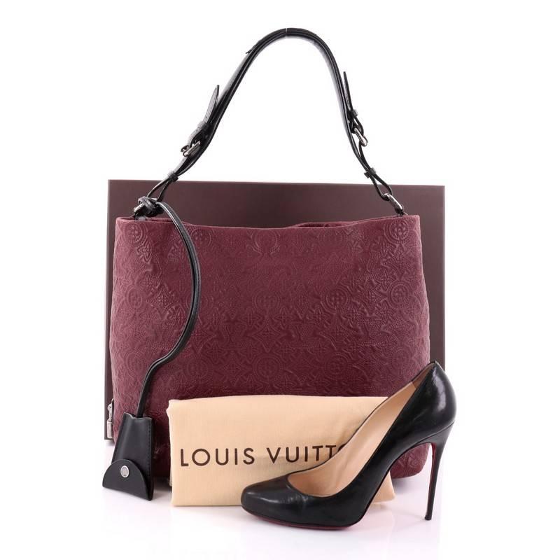 This authentic Louis Vuitton Antheia Hobo Leather PM inspired by the Greek goddess of flowers mixes casual elegance with exquisite craftsmanship. Luxuriously crafted from dark red leather with Louis Vuitton's monogram flower embossed stitching, this