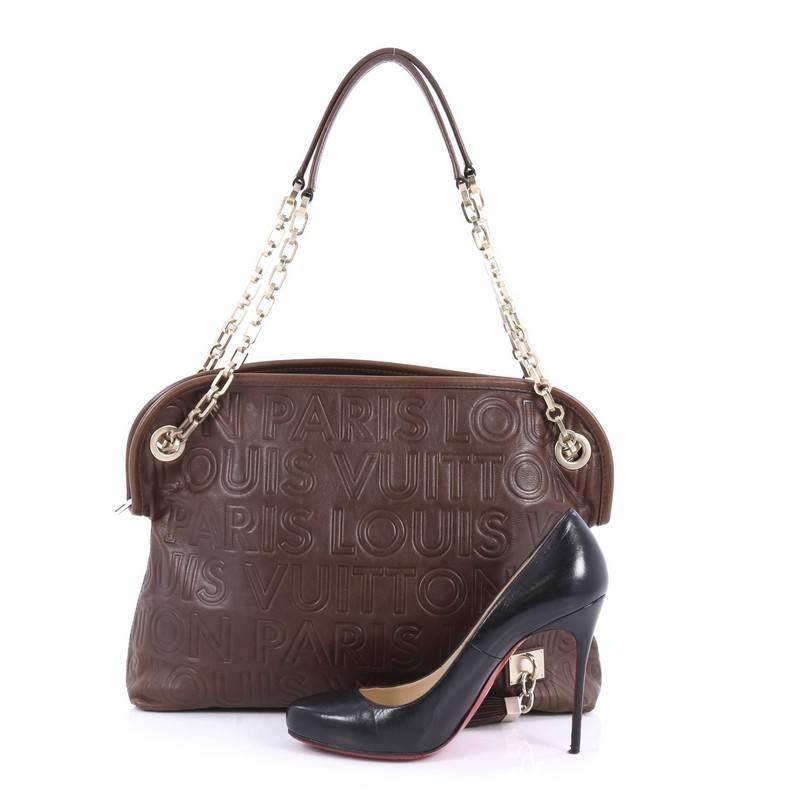 This authentic Louis Vuitton Limited Edition Paris Souple Wish Bag Leather is one of Marc Jacob's standout design from Louis Vuitton's Fall/Winter 2008 Collection. Crafted from brown embossed leather, this popular wish bag features leather handles