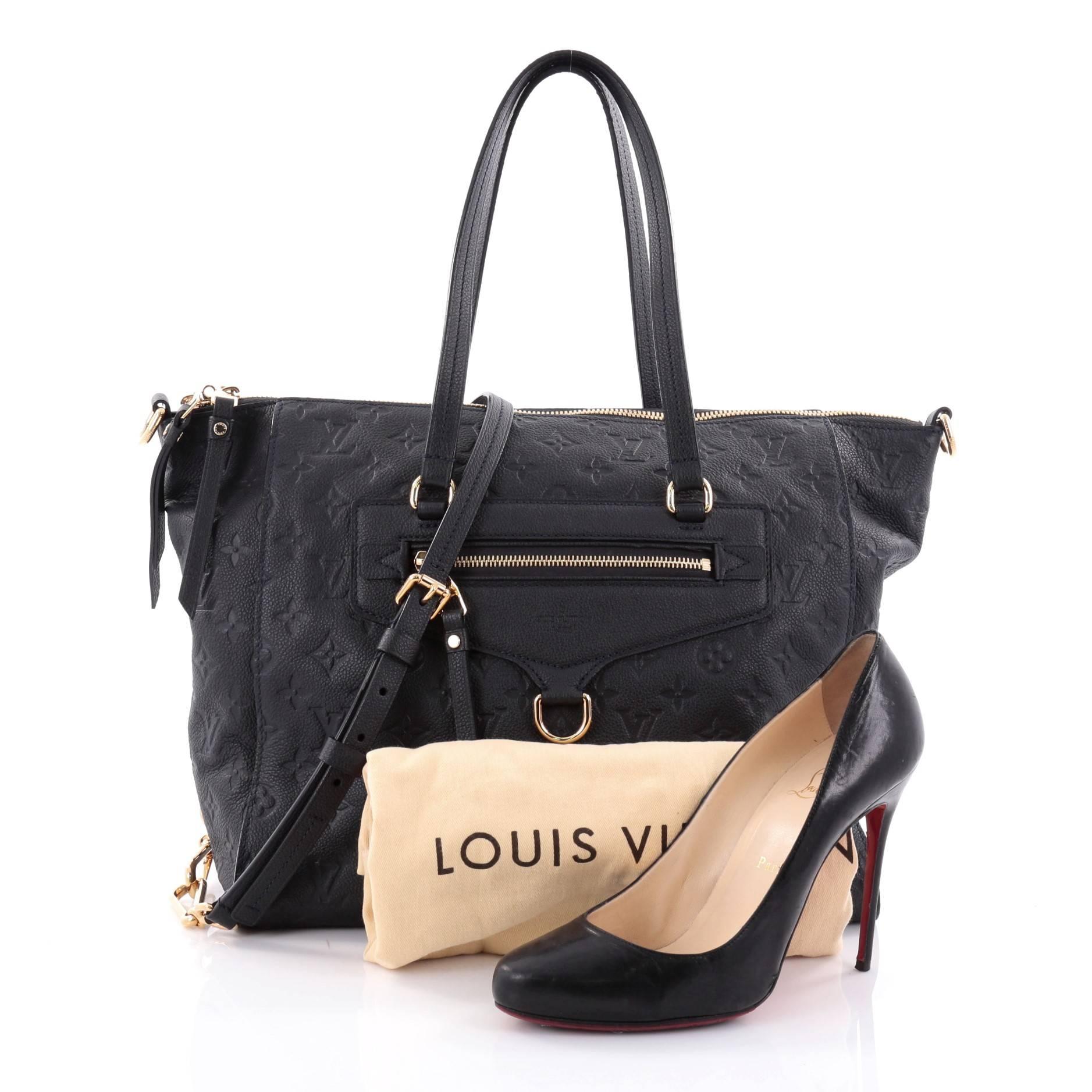 This authentic Louis Vuitton Lumineuse Handbag Monogram Empreinte Leather PM showcases everyday sophistication. Crafted in navy blue monogram empreinte leather, this functional yet stylish tote features an exterior front zip pocket, dual-flat