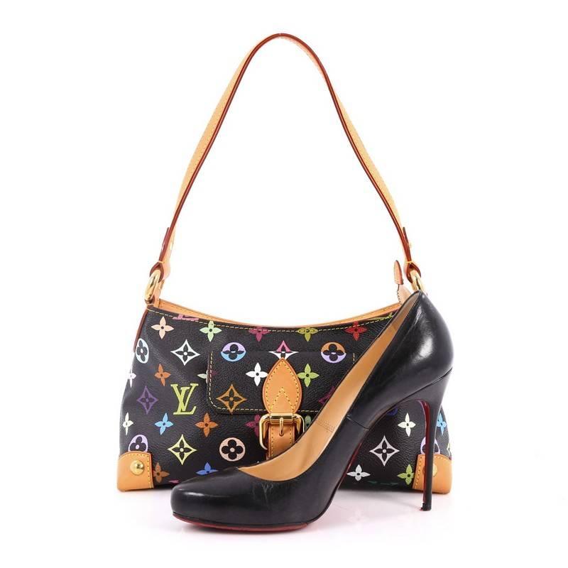 This authentic Louis Vuitton Eliza Handbag Monogram Multicolor is chic and feminine in a design ideal for a sophisticated and casual look. Crafted in Japanese artist Takashi Murakami's black multicolor monogram coated canvas, this petite bag