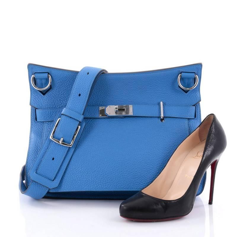 This authentic Hermes Jypsiere Handbag Clemence 34 is a current and favorite style among Hermes lovers. Inspired by the brand's iconic Kelly bag, this luxurious and industrial messenger is crafted in scratch-resistant bleu hydra clemence leather