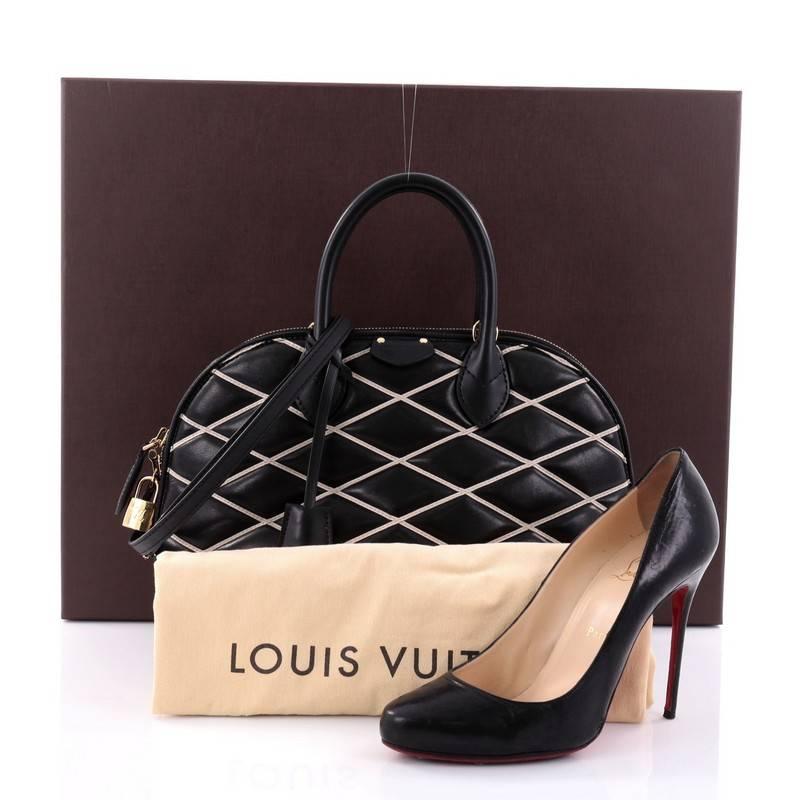 This authentic Louis Vuitton Alma Handbag Malletage Leather PM is the perfect bag to use for your needs for daytime or evening with luxury and style. Crafted in black leather with a white diamond quilt, this exceptional bag features dual-rolled