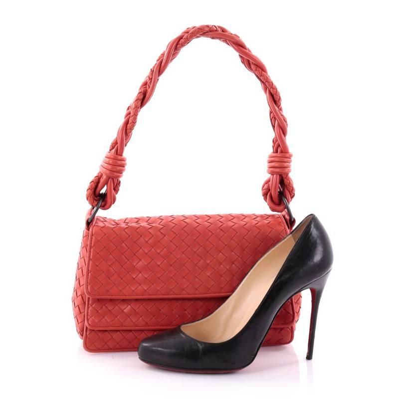 This authentic Bottega Veneta Braided Double Flap Bag Intrecciato Nappa Small combines the brand's casual design with high craftsmanship. Constructed with Bottega Veneta's signature intrecciato pattern in red, this simple yet luxurious shoulder bag